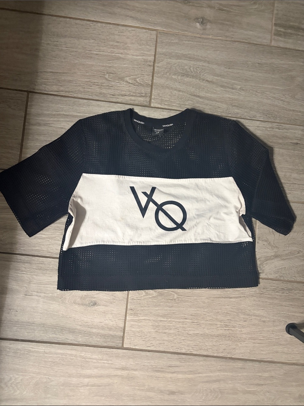 Vanquish Fitness black mesh crop top